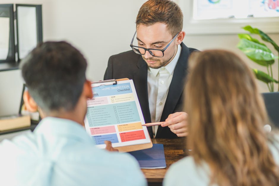 Business professional showing clients a checklist document during a meeting at Frontline Collections – London Office (Debt Collection).